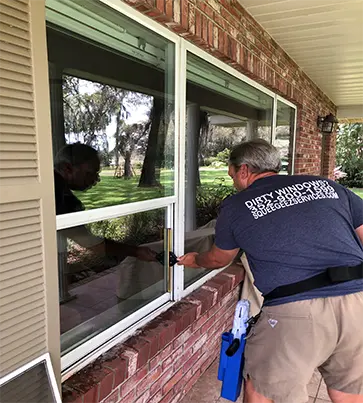 Family cleaning window in Leesburg FL